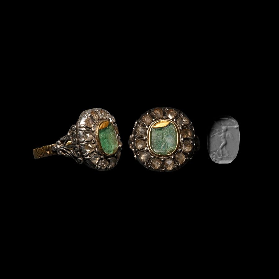 Diamond Locket Ring Set with Emerald Intaglio of Eros, the Greek God of Love, Playing Aulos