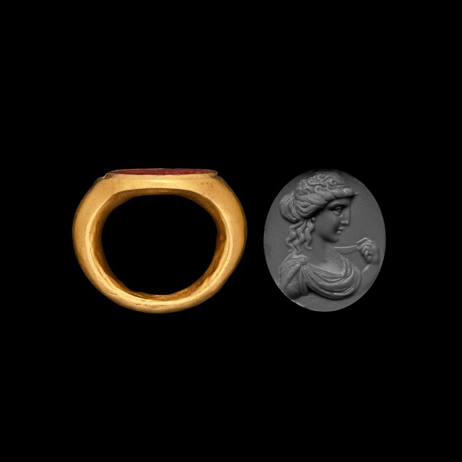Roman Gold Ring with Carnelian Gemstone with Bust of a Goddess