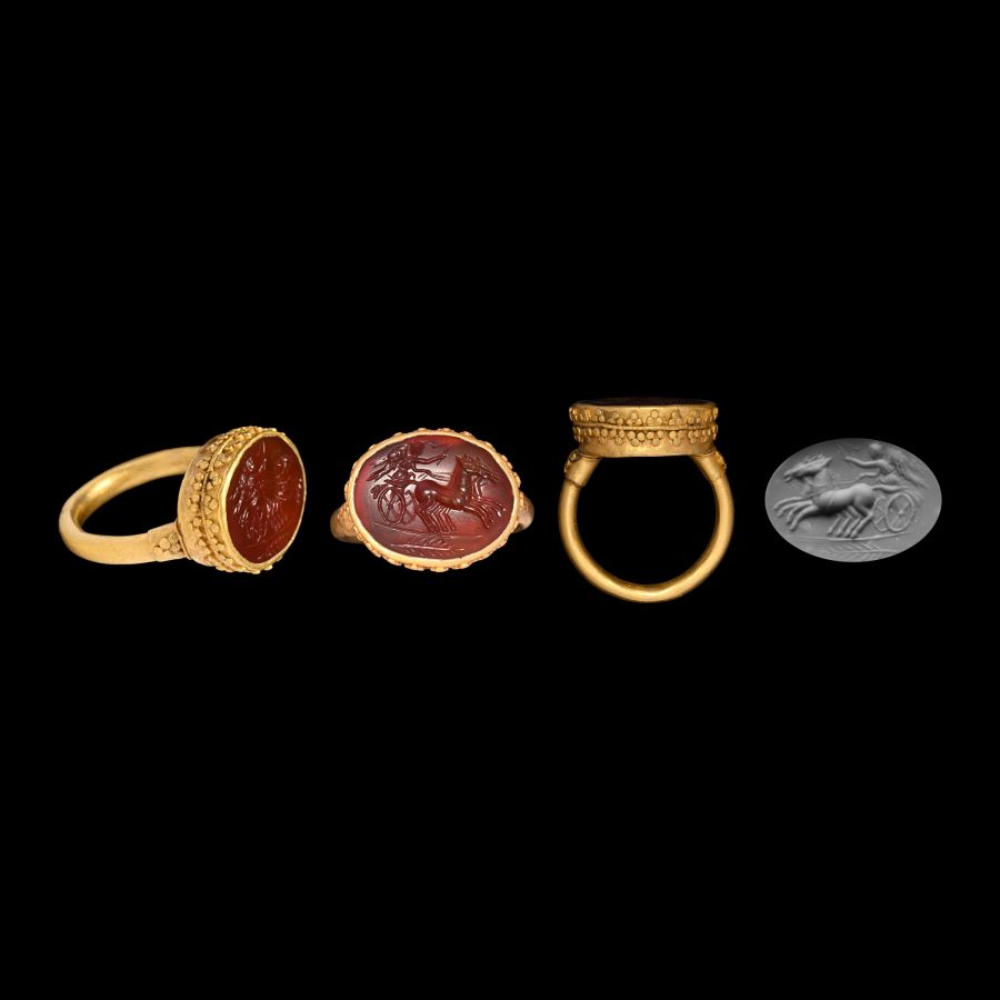 Post Medieval Gold Ring with Gemstone representing a Winged Victory Charioteer