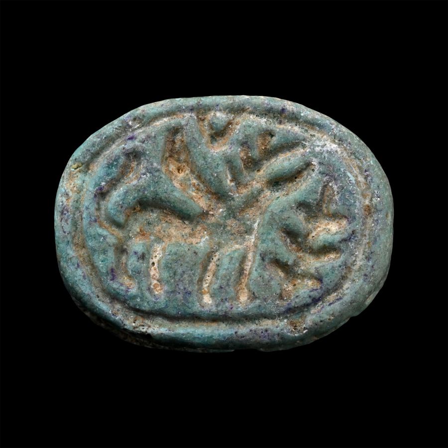 Phoenician Blue Glazed Faience Scaraboid with Winged Beast and Tree
