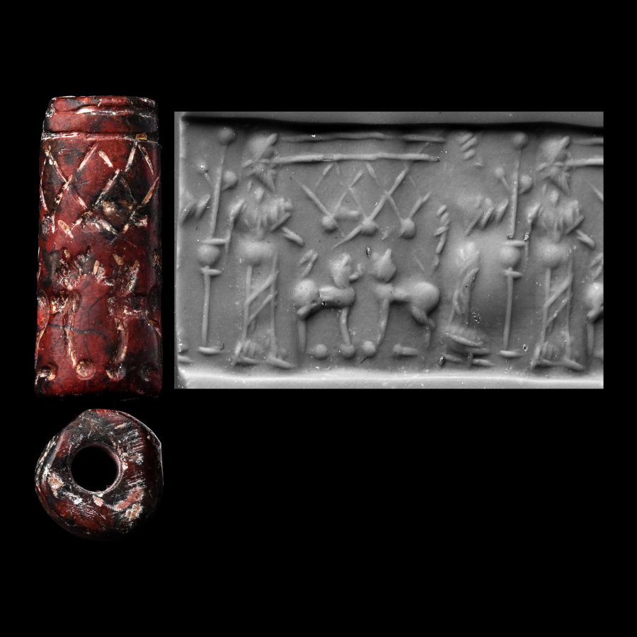 Western Asiatic Dark Red Jasper Cylinder Seal with Figural Scene