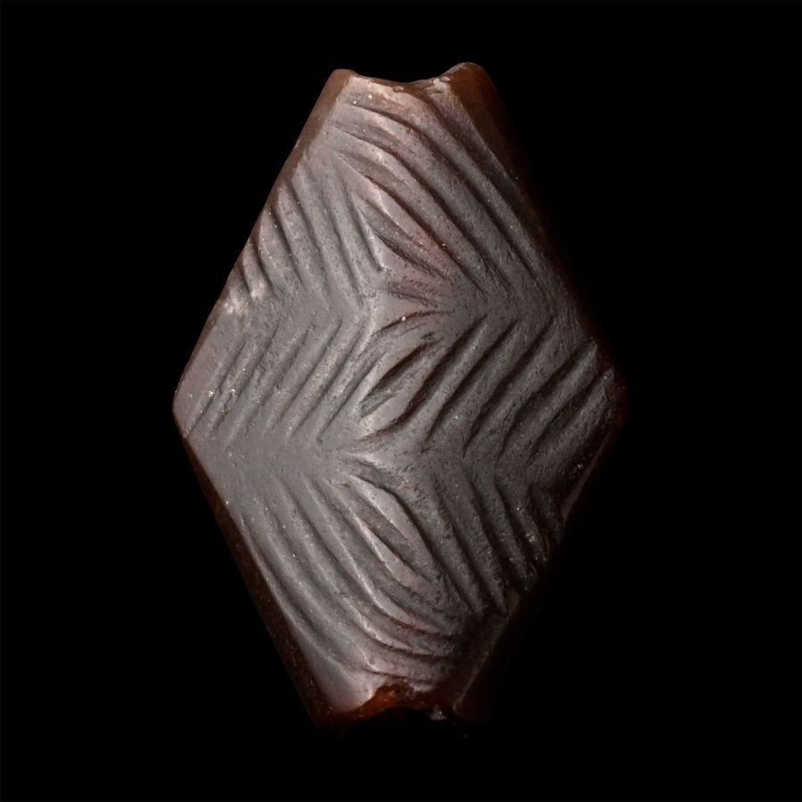 Western Asiatic Decorated Dark Agate Bead
