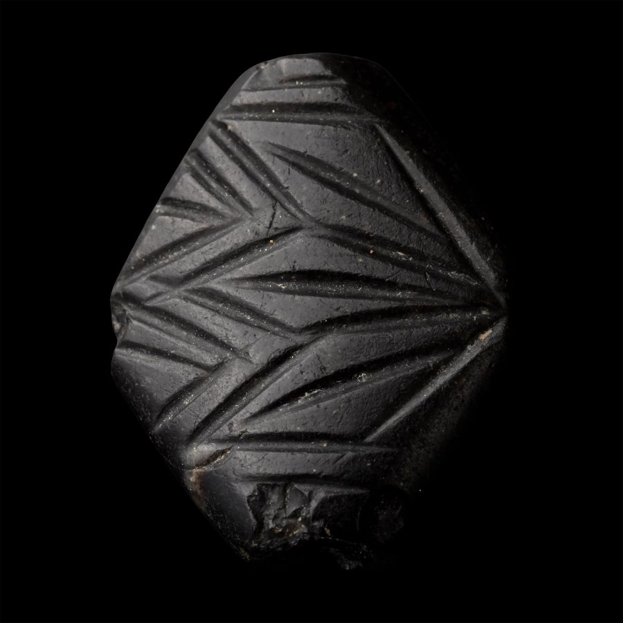 Western Asiatic Decorated Black Stone Bead