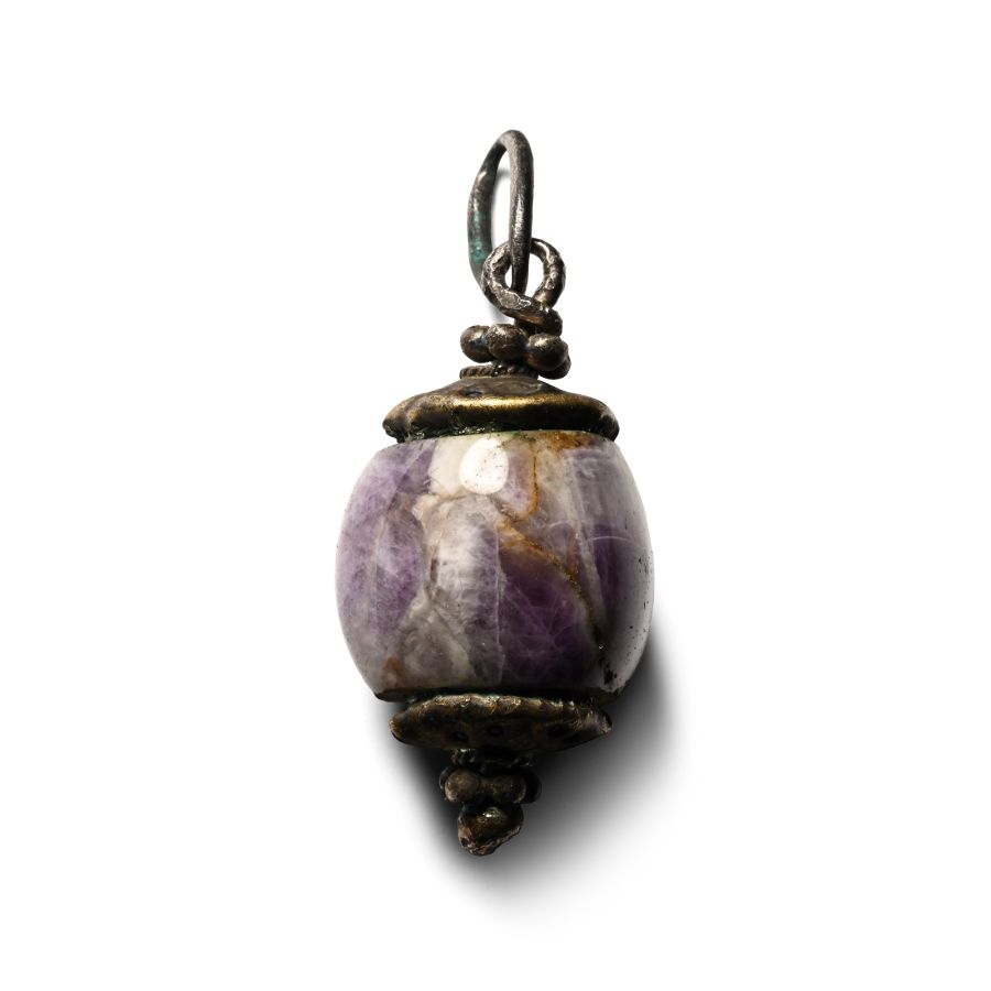 Viking Age Bronze Pendant with Polished Amethyst Bead