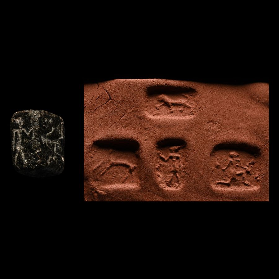 Mesopotamian Black Stone Four-Sided Seal with Heads and Animals
