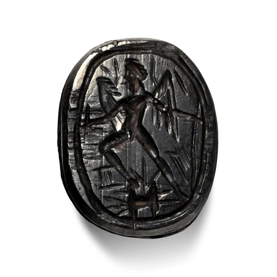 Egypto-Phoenician Period Haematite Scarab with Winged Figure