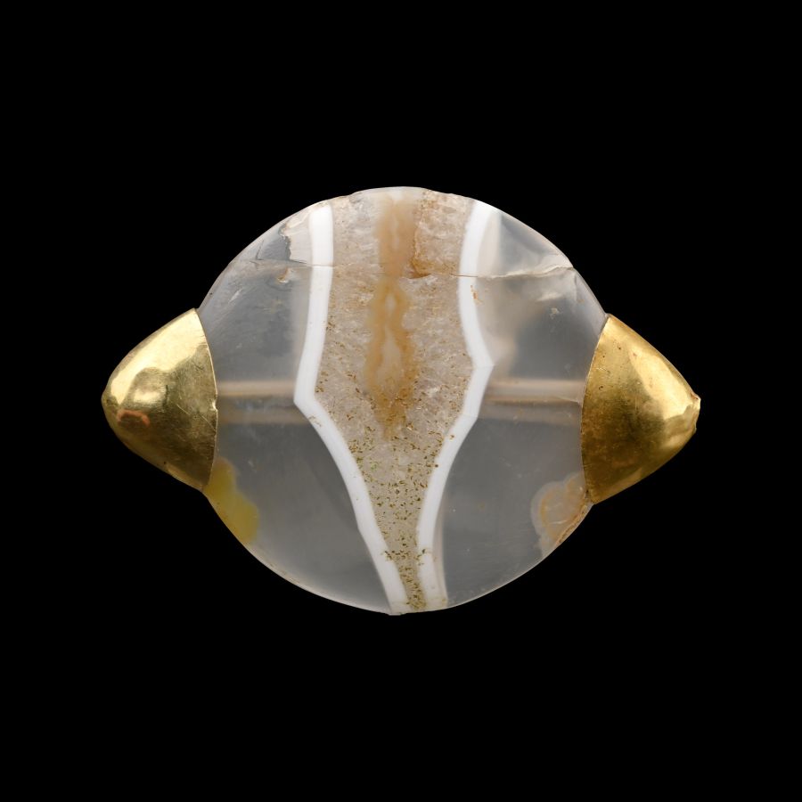An Exceptional Western Asiatic Banded Agate Bead with Gold Caps