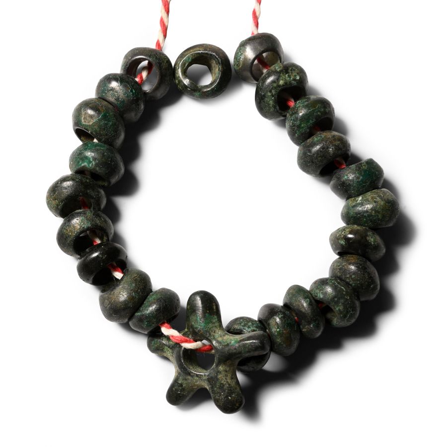 Bronze Age Star Pendant and Bead Group