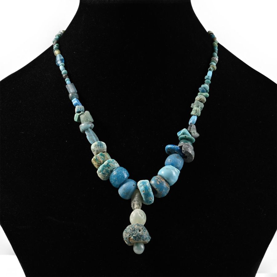 Western Asiatic and Other Pale Blue Stone and Glass Bead Necklace String