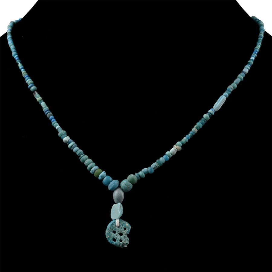 Western Asiatic and Other Pale Blue Stone and Glass Bead Necklace String