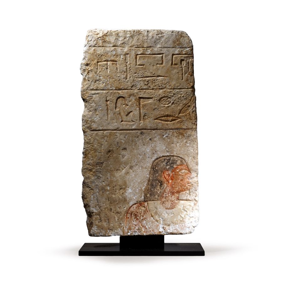 Egyptian Limestone Relief with Painted Head and Hieroglyphics