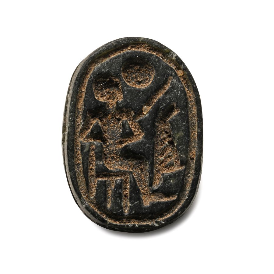 Egyptian Black Stone Scarab with Seated Figure