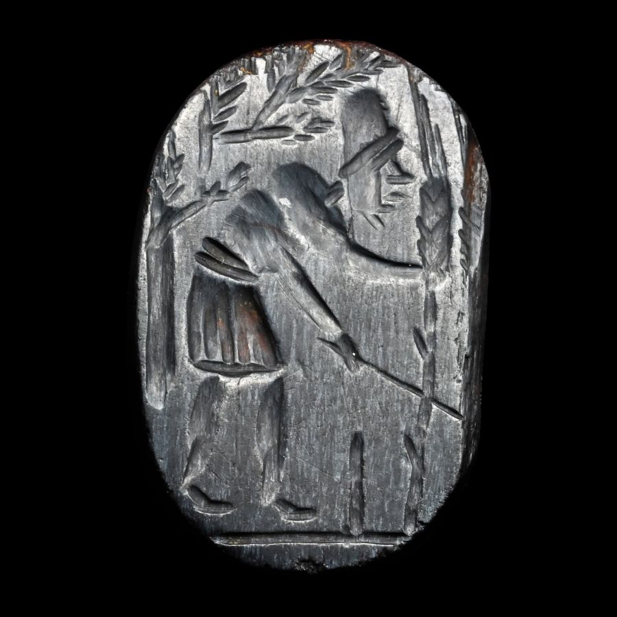 Roman Gnostic Bifacial Hematite Gemstone with Magical Scene and Inscription