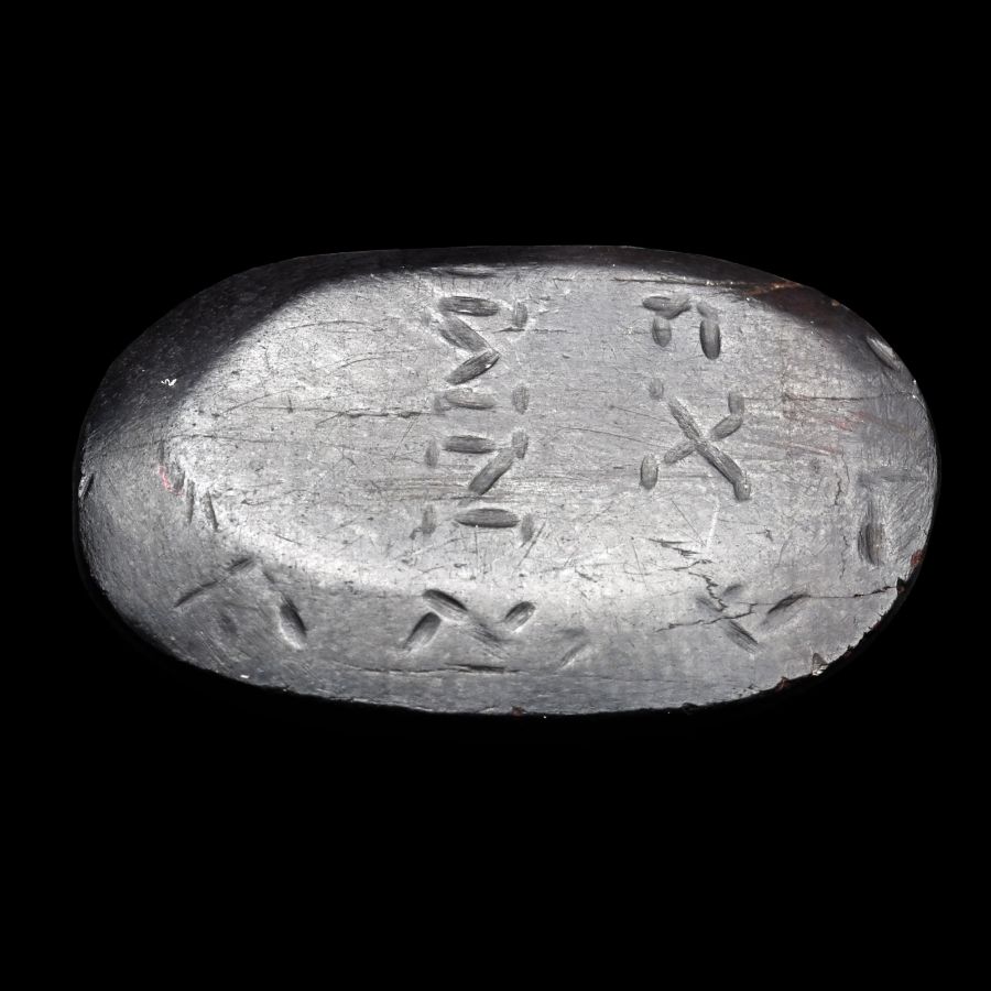 Roman Gnostic Bifacial Hematite Gemstone with Magical Scene and Inscription