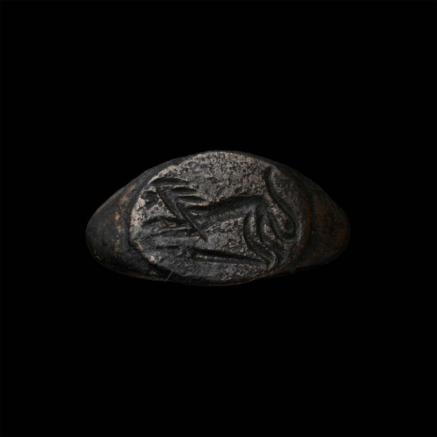 Greek Bronze Ring with Crouching Lion