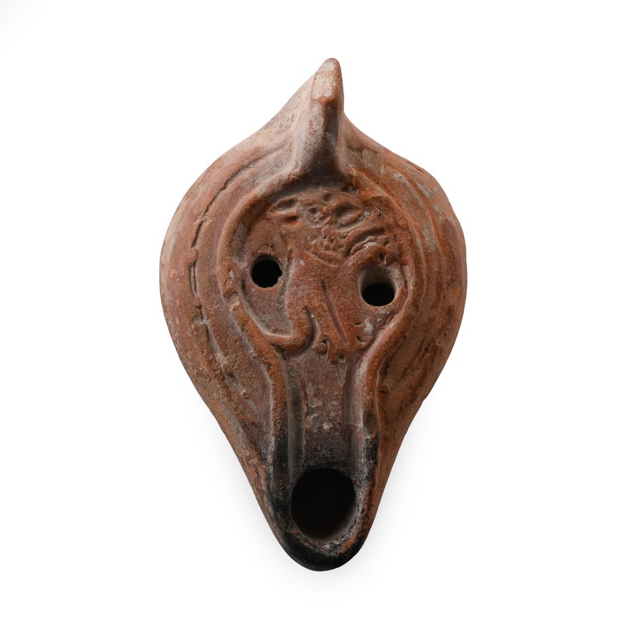 Late Roman Redware Oil Lamp with Leaping Lion