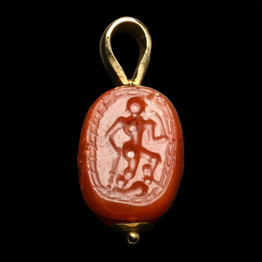Greek Carnelian Scarab Engraved with Hercules with Later Gold Setting