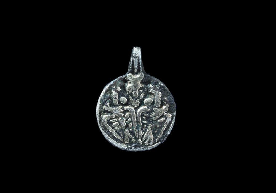 Viking Silver-Gilt Pendant with Odin Gripping Two Ravens